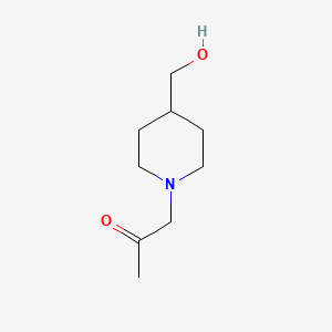 molecular formula C9H17NO2 B1464929 1-[4-(Hydroxymethyl)piperidin-1-yl]propan-2-one CAS No. 1250894-97-3