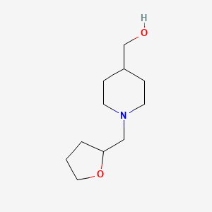 molecular formula C11H21NO2 B1465424 (1-((Tetrahydrofuran-2-yl)methyl)piperidin-4-yl)methanol CAS No. 1247850-80-1
