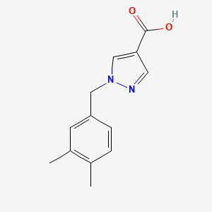 molecular formula C13H14N2O2 B1465609 1-[(3,4-二甲苯基)甲基]-1H-吡唑-4-羧酸 CAS No. 1271696-24-2