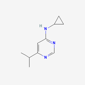 molecular formula C10H15N3 B1465691 N-cyclopropyl-6-(propan-2-yl)pyrimidin-4-amine CAS No. 1251151-69-5