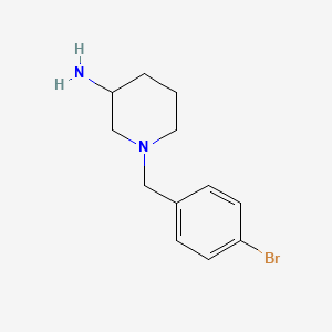1-[(4-Bromophenyl)methyl]piperidin-3-amine