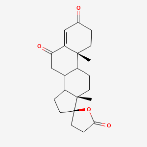 molecular formula C22H28O4 B14660969 (10R,13S,17R)-10,13-Dimethyl-1,2,7,8,9,10,11,12,13,14,15,16-dodecahydro-5'H-spiro[cyclopenta[a]phenanthrene-17,2'-oxolane]-3,5',6-trione CAS No. 38753-78-5