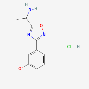 molecular formula C11H14ClN3O2 B1466271 1-[3-(3-Methoxyphenyl)-1,2,4-oxadiazol-5-yl]ethan-1-amine hydrochloride CAS No. 1354961-22-0