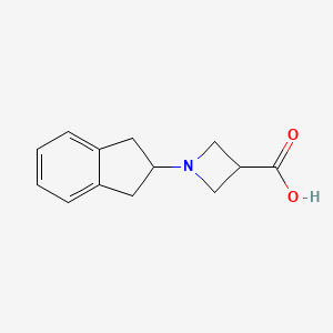 molecular formula C13H15NO2 B1466360 1-(2,3-dihydro-1H-inden-2-yl)azetidine-3-carboxylic acid CAS No. 1127402-41-8