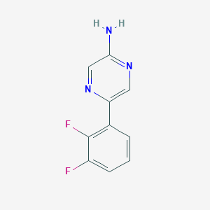molecular formula C10H7F2N3 B1466599 5-(2,3-Difluorophenyl)pyrazin-2-amine CAS No. 1489671-37-5
