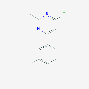 molecular formula C13H13ClN2 B1466600 4-Chloro-6-(3,4-dimethylphenyl)-2-methylpyrimidine CAS No. 1468533-32-5