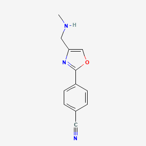 molecular formula C12H11N3O B1466692 4-{4-[(Methylamino)methyl]-1,3-oxazol-2-yl}benzonitrile CAS No. 1443981-39-2