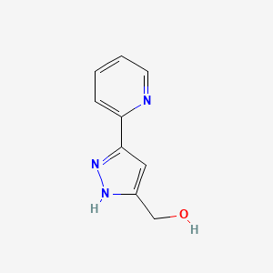 molecular formula C9H9N3O B1466719 (3-(pyridin-2-yl)-1H-pyrazol-5-yl)methanol CAS No. 828911-09-7