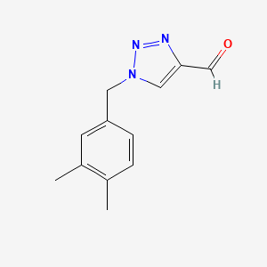 1-[(3,4-dimethylphenyl)methyl]-1H-1,2,3-triazole-4-carbaldehyde
