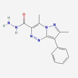 molecular formula C14H14N6O B1467604 4,7-二甲基-8-苯基吡唑并[5,1-c][1,2,4]三嗪-3-碳酰肼 CAS No. 1374509-58-6