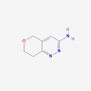 molecular formula C7H9N3O B1468023 5H,7H,8H-pyrano[4,3-c]pyridazin-3-amine CAS No. 1490340-46-9