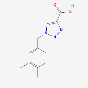 molecular formula C12H13N3O2 B1468059 1-[(3,4-二甲基苯基)甲基]-1H-1,2,3-三唑-4-羧酸 CAS No. 1491833-09-0