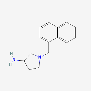 molecular formula C15H18N2 B1468409 1-(Naphthalen-1-ylmethyl)pyrrolidin-3-amine CAS No. 1456342-34-9