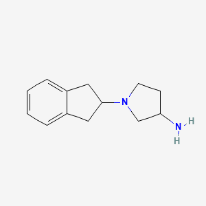 molecular formula C13H18N2 B1468436 1-(2,3-dihydro-1H-inden-2-yl)pyrrolidin-3-amine CAS No. 1249719-46-7