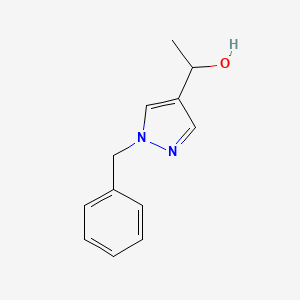 molecular formula C12H14N2O B1468495 1-(1-苄基-1H-吡唑-4-基)-乙醇 CAS No. 1339048-98-4