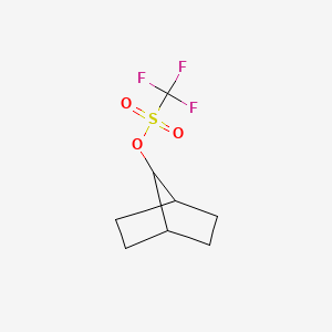 molecular formula C8H11F3O3S B14685807 Bicyclo[2.2.1]heptan-7-yl trifluoromethanesulfonate CAS No. 25354-43-2