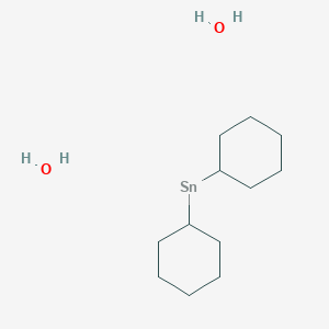 Dicyclohexyl-lambda~2~-stannane--water (1/2)