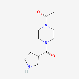 molecular formula C11H19N3O2 B1468715 1-[4-(Pyrrolidine-3-carbonyl)piperazin-1-yl]ethan-1-one CAS No. 1340426-38-1