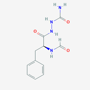 molecular formula C11H14N4O3 B14687583 N-Formylphenylalanine semicarbazide CAS No. 35858-70-9