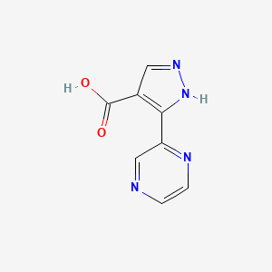 molecular formula C8H6N4O2 B1469173 3-(pyrazin-2-yl)-1H-pyrazole-4-carboxylic acid CAS No. 1344018-75-2