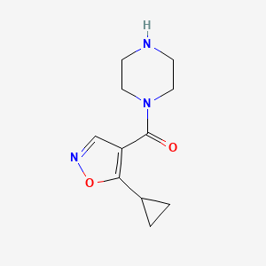 molecular formula C11H15N3O2 B1469729 1-[(5-Cyclopropylisoxazol-4-yl)carbonyl]piperazine CAS No. 1428234-44-9