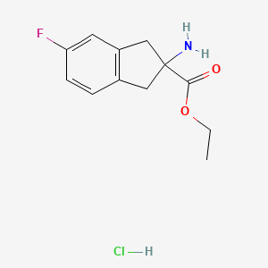 molecular formula C12H15ClFNO2 B1469734 Ethyl-2-Amino-5-Fluor-2,3-Dihydro-1H-Inden-2-carboxylat-Hydrochlorid CAS No. 1272758-28-7