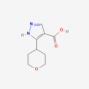 molecular formula C9H12N2O3 B1470243 5-(四氢-2H-吡喃-4-基)-1H-吡唑-4-羧酸 CAS No. 1780459-83-7