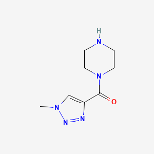 molecular formula C8H13N5O B1470273 (1-methyl-1H-1,2,3-triazol-4-yl)(piperazin-1-yl)methanone CAS No. 1537451-76-5