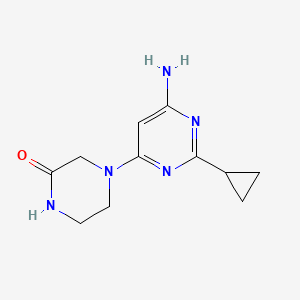 molecular formula C11H15N5O B1470753 4-(6-氨基-2-环丙基嘧啶-4-基)哌嗪-2-酮 CAS No. 1499856-41-5