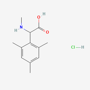 molecular formula C12H18ClNO2 B1471144 2-(Methylamino)-2-(2,4,6-trimethylphenyl)acetic acid hydrochloride CAS No. 1803570-08-2