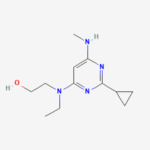 molecular formula C12H20N4O B1471669 2-((2-Cyclopropyl-6-(methylamino)pyrimidin-4-yl)(ethyl)amino)ethan-1-ol CAS No. 1513295-79-8