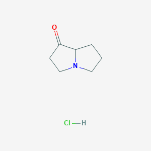 molecular formula C7H12ClNO B1472194 Hexahydro-pyrrolizin-1-one hydrochloride CAS No. 1373223-54-1
