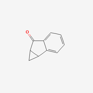 molecular formula C10H8O B14724956 1a,6a-Dihydrocyclopropa[a]inden-6(1H)-one CAS No. 5771-62-0