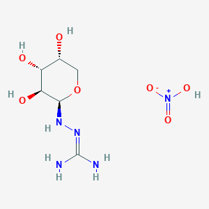 molecular formula C6H15N5O7 B1472765 N-1-b-D-Arabinopyranosylamino guanidine HNO3 CAS No. 368452-60-2