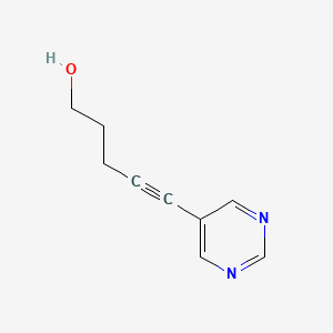 molecular formula C9H10N2O B1472784 5-(Pyrimidin-5-yl)pent-4-yn-1-ol CAS No. 1564468-93-4