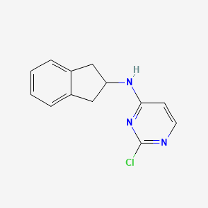 molecular formula C13H12ClN3 B1474480 2-chloro-N-(2,3-dihydro-1H-inden-2-yl)pyrimidin-4-amine CAS No. 1920770-89-3