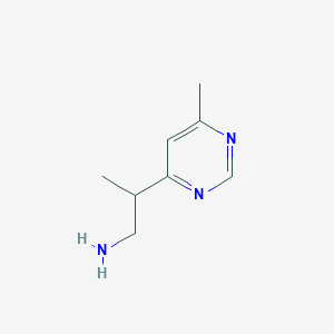 molecular formula C8H13N3 B1474869 2-(6-Methylpyrimidin-4-yl)propan-1-amine CAS No. 1495450-03-7