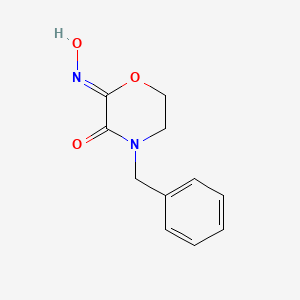 molecular formula C11H12N2O3 B1475041 (2Z)-4-benzyl-2-(hydroxyimino)morpholin-3-one CAS No. 1937343-55-9