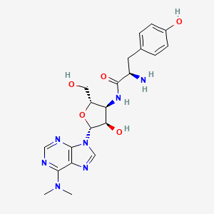 (2R)-2-amino-N-[(2S,3S,4R,5R)-5-[6-(dimethylamino)purin-9-yl]-4-hydroxy-2-(hydroxymethyl)oxolan-3-yl]-3-(4-hydroxyphenyl)propanamide