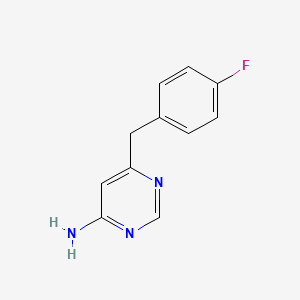 6-[(4-Fluorophenyl)methyl]pyrimidin-4-amine