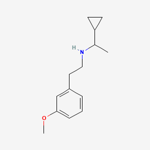 molecular formula C14H21NO B1475438 (1-Cyclopropylethyl)[2-(3-methoxyphenyl)ethyl]amine CAS No. 1602568-60-4