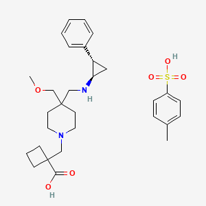 1-[[4-(methoxymethyl)-4-[[[(1R,2S)-2-phenylcyclopropyl]amino]methyl]piperidin-1-yl]methyl]cyclobutane-1-carboxylic acid;4-methylbenzenesulfonic acid