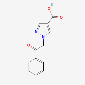 molecular formula C12H10N2O3 B1475896 1-(2-oxo-2-phenylethyl)-1H-pyrazole-4-carboxylic acid CAS No. 2098031-29-7