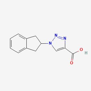 molecular formula C12H11N3O2 B1476144 1-(2,3-二氢-1H-茚-2-基)-1H-1,2,3-三唑-4-羧酸 CAS No. 2098079-43-5