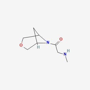 1-(3-Oxa-6-azabicyclo[3.1.1]heptan-6-yl)-2-(methylamino)ethan-1-one