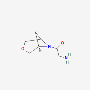 molecular formula C7H12N2O2 B1476736 2-Amino-1-(3-oxa-6-azabicyclo[3.1.1]heptan-6-yl)ethan-1-one CAS No. 2097978-91-9