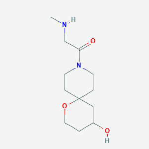 molecular formula C12H22N2O3 B1477199 1-(4-Hydroxy-1-oxa-9-azaspiro[5.5]undecan-9-yl)-2-(methylamino)ethan-1-one CAS No. 2098048-69-0