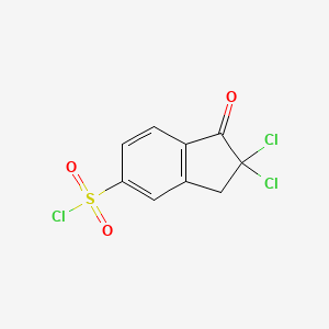 molecular formula C9H5Cl3O3S B1477954 2,2-dichloro-1-oxo-2,3-dihydro-1H-indene-5-sulfonyl chloride CAS No. 1803598-16-4