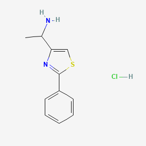 molecular formula C11H13ClN2S B1478059 Clorhidrato de 1-(2-Fenil-1,3-tiazol-4-il)etan-1-amina CAS No. 1803606-25-8