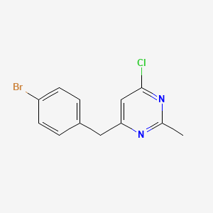 4-(4-Bromobenzyl)-6-chloro-2-methylpyrimidine